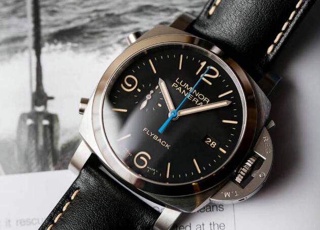 The blue second hand is eye-catching on the black dial.